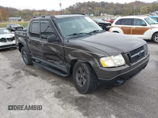 2005 Ford Explorer Sport Trac XLS z VIN 1FMZU77K05UB13891, wystawiony jako IAAI lot #40859877 z przebiegiem 157 308 mil mil oraz . Historia ofert i sprzedaży dostępna na DreamBid. Obrazek 1.