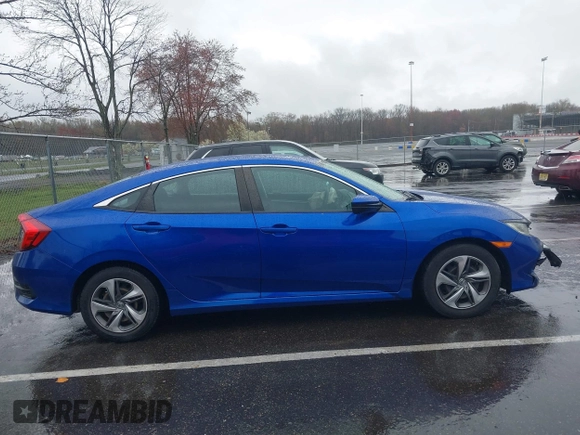2019 Honda Civic LX with VIN 2HGFC2F64KH579860, listed as a IAAI auction lot 42026395 with 49,834 mi miles and . Bid and sale history available at DreamBid. Image 14.