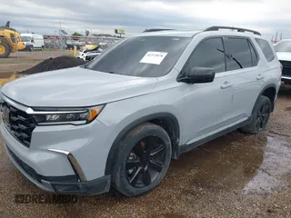 2024 Honda Pilot Touring z VIN 5FNYG1H71RB005034, wystawiony jako IAAI lot #42371878 z przebiegiem Nie podano mil oraz . Historia ofert i sprzedaży dostępna na DreamBid. Obrazek 16.