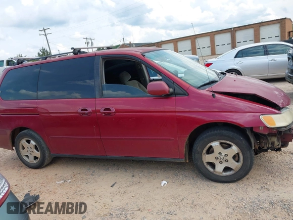 2002 Honda Odyssey EX with VIN 5FNRL18612B028570, listed as a IAAI auction lot 42491201 with 203,401 mi miles and . Bid and sale history available at DreamBid. Image 14.