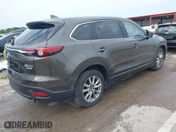 2017 Mazda CX-9 Touring z VIN JM3TCACY7H0129335, wystawiony jako IAAI lot #42289926 z przebiegiem 60 425 mil mil oraz . Historia ofert i sprzedaży dostępna na DreamBid. Obrazek 4.