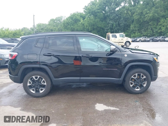 2018 Jeep Compass Trailhawk z VIN 3C4NJDDB1JT264032, wystawiony jako IAAI lot #42524893 z przebiegiem 96 399 mil mil oraz . Historia ofert i sprzedaży dostępna na DreamBid. Obrazek 13.