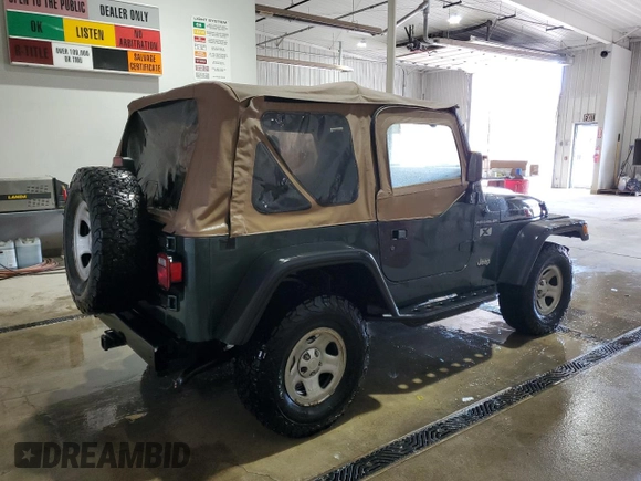2002 Jeep Wrangler X with VIN 1J4FA39SX2P718415, listed as a Copart auction lot 52788015 with 152,093 mi miles and Salvage Title. Bid and sale history available at carsss.com. Image 3.