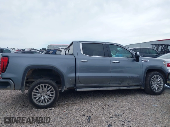 2019 GMC Sierra 1500 Denali with VIN 1GTU9FEL7KZ355632, listed as a IAAI auction lot 42487913 with 51,467 mi miles and . Bid and sale history available at DreamBid. Image 14.