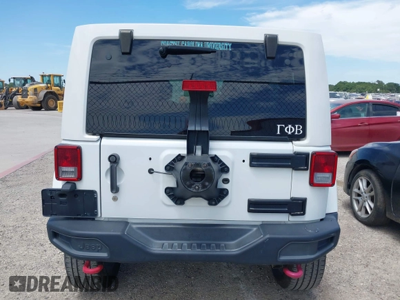 2015 Jeep Wrangler Unlimited Rubicon z VIN 1C4BJWFG1FL544883, wystawiony jako IAAI lot #42838891 z przebiegiem 87 801 mil mil oraz . Historia ofert i sprzedaży dostępna na DreamBid. Obrazek 16.