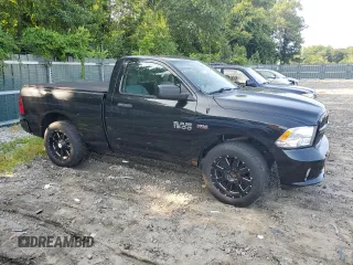 2015 Ram 1500 Tradesman with VIN 3C6JR6AT8FG698858, listed as a Copart auction lot 62521184 with 136,673 mi miles and Salvage title. Bid and sale history available at DreamBid. Image 4.