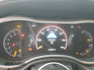 2015 Jeep Grand Cherokee Overland with VIN 1C4RJFCG7FC925995, listed as a Copart auction lot 85421214 with 142,266 mi miles and Salvage Title. Bid and sale history available at carsss.com. Image 9.