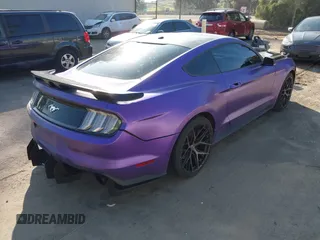 2015 Ford Mustang EcoBoost with VIN 1FA6P8TH5F5358816, listed as a IAAI auction lot 41573005 with 57,975 mi miles and . Bid and sale history available at carsss.com. Image 4.