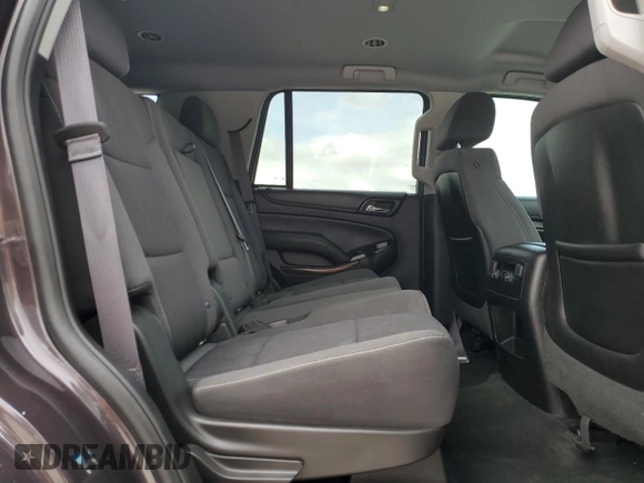 2015 Chevrolet Tahoe LS with VIN 1GNSCAKC4FR116004, listed as a Copart auction lot 54599375 with 87,645 mi miles and Salvage title. Bid and sale history available at DreamBid. Image 11.