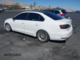 2014 Volkswagen Jetta GLI Autobahn with VIN 3VW5T7AJ8EM367002, listed as a IAAI auction lot 42032055 with 186,301 mi miles and . Bid and sale history available at DreamBid. Image 3.
