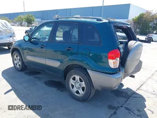 2003 Toyota RAV4 with VIN JTEGH20V936014264, listed as a IAAI auction lot 41845767 with 142,137 mi miles. Bid and sale history available at carsss.com. Image 3.