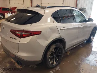 2020 Alfa Romeo Stelvio Sport with VIN ZASPAKAN7L7C97725, listed as a IAAI auction lot 41627878 with 43,523 mi miles. Bid and sale history available at carsss.com. Image 4.