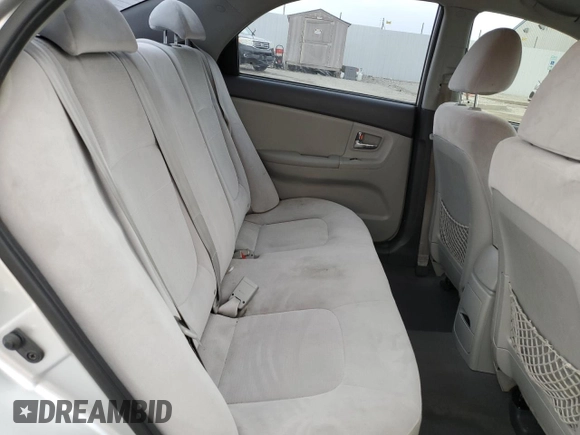 2009 Kia Spectra EX with VIN KNAFE221595657550, listed as a Copart auction lot 52805205 with 95,777 mi miles and Salvage Title. Bid and sale history available at DreamBid. Image 10.