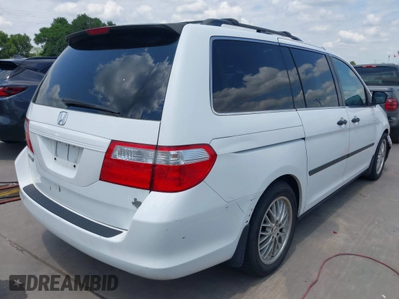 2007 Honda Odyssey LX with VIN 5FNRL382X7B135892, listed as a IAAI auction lot 42223231 with 204,054 mi miles and . Bid and sale history available at DreamBid. Image 4.