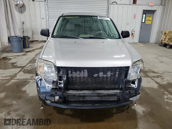 2008 Mercury Mariner с VIN 4M2CU91138KJ15103, выставлен на аукционе Copart как лот 60039585 с пробегом 157 481 миль миль и Списание • Salvage title. История ставок и продаж доступна на DreamBid. Изображение 5.