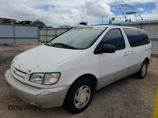 1999 Toyota Sienna LE with VIN 4T3ZF13C4XU134680, listed as a Copart auction lot 74044544 with 127,954 mi miles and Clean Title. Bid and sale history available at carsss.com. Image 1.