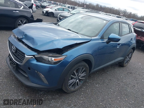 2018 Mazda CX-3 Touring with VIN JM1DKFC78J0322460, listed as a IAAI auction lot 41730662 with 58,841 mi miles. Bid and sale history available at carsss.com. Image 18.