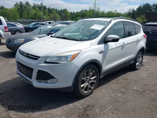 2013 Ford Escape SEL z VIN 1FMCU9HX1DUA51248, wystawiony jako IAAI lot #42185187 z przebiegiem 123 845 mil mil oraz . Historia ofert i sprzedaży dostępna na DreamBid. Obrazek 2.