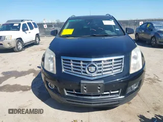 2014 Cadillac SRX Performance Collection z VIN 3GYFNCE35ES517868, wystawiony jako IAAI lot #41775522 z przebiegiem 166 960 mil mil oraz . Historia ofert i sprzedaży dostępna na DreamBid. Obrazek 12.