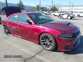 2023 Dodge Charger Scat Pack Widebody with VIN 2C3CDXGJ2PH583643, listed as a IAAI auction lot 41627260 with 21,497 mi miles. Bid and sale history available at carsss.com. Image 1.
