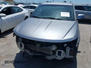2017 Dodge Journey SXT z VIN 3C4PDDBGXHT618056, wystawiony jako IAAI lot #42241207 z przebiegiem 146 430 mil mil oraz . Historia ofert i sprzedaży dostępna na DreamBid. Obrazek 13.