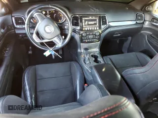 2021 Jeep Grand Cherokee Trailhawk with VIN 1C4RJFLG5MC627975, listed as a Copart auction lot 83080204 with 83,642 mi miles and Salvage Title. Bid and sale history available at carsss.com. Image 8.