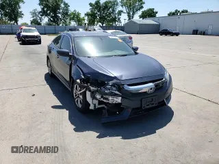 2017 Honda Civic LX z VIN 2HGFC2F55HH523474, wystawiony jako Copart lot #54933425 z przebiegiem 133 036 mil mil oraz Szkoda całkowita • Salvage title. Historia ofert i sprzedaży dostępna na DreamBid. Obrazek 13.