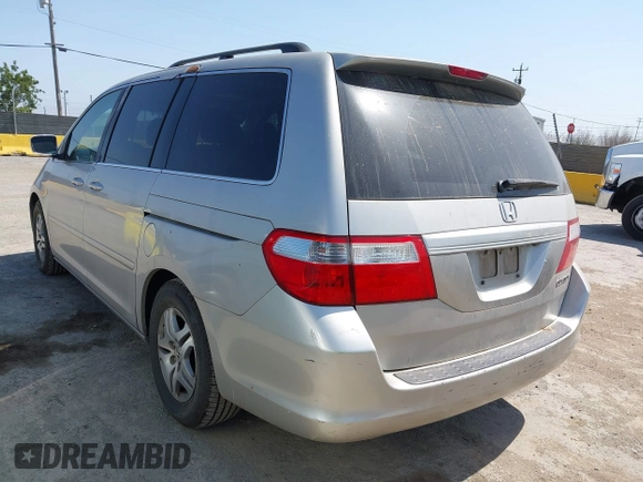 2005 Honda Odyssey EX-L z VIN 5FNRL38765B135803, wystawiony jako IAAI lot #42421288 z przebiegiem 185 043 mil mil oraz . Historia ofert i sprzedaży dostępna na DreamBid. Obrazek 3.