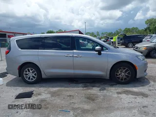 2017 Chrysler Pacifica Touring with VIN 2C4RC1DG7HR516711, listed as a IAAI auction lot 42633544 with 97,853 mi miles and . Bid and sale history available at DreamBid. Image 13.