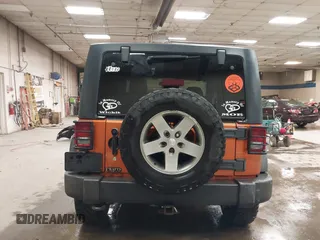 2011 Jeep Wrangler Rubicon with VIN 1J4BA6D15BL624268, listed as a IAAI auction lot 41430121 with 142,433 mi miles and . Bid and sale history available at carsss.com. Image 17.