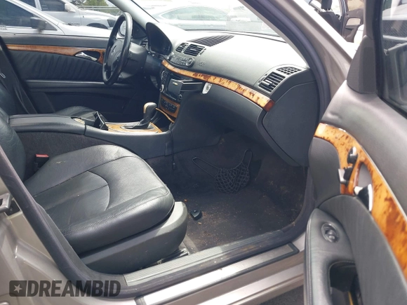 2003 Mercedes-Benz E-Class 3.2L with VIN WDBUF65JX3A341682, listed as a IAAI auction lot 42107536 with 1 mi miles. Bid and sale history available at carsss.com. Image 5.
