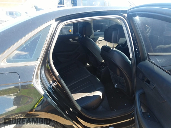 2018 Audi A4 Premium with VIN WAUDNAF47JN017320, listed as a IAAI auction lot 39069216 with 66,113 mi miles and . Bid and sale history available at DreamBid. Image 8.