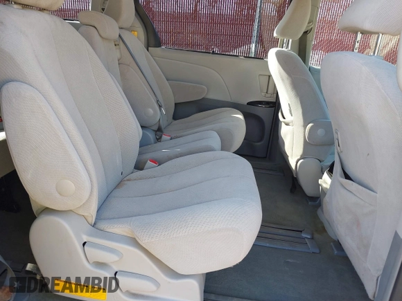 2012 Toyota Sienna LE AAS with VIN 5TDKK3DC6CS238848, listed as a IAAI auction lot 41728728 with 142,240 mi miles. Bid and sale history available at carsss.com. Image 8.