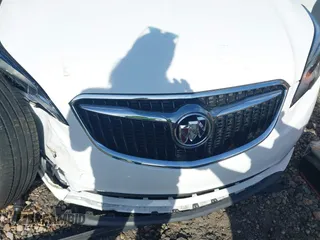 2020 Buick Envision Essence with VIN LRBFXCSA7LD014163, listed as a IAAI auction lot 41102656 with 23,277 mi miles and . Bid and sale history available at carsss.com. Image 18.