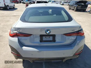 2022 BMW i4 eDrive40 with VIN WBY73AW07NFN14854, listed as a Copart auction lot 54082504 with 10,936 mi miles. Bid and sale history available at carsss.com. Image 6.