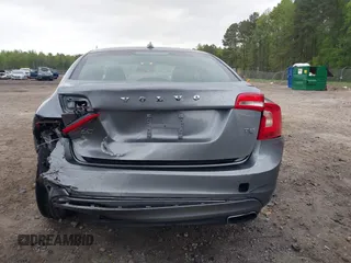 2016 Volvo S60 T5 Drive-E z VIN YV126MFJ2G2406126, wystawiony jako IAAI lot #41967696 z przebiegiem 122 884 mil mil oraz . Historia ofert i sprzedaży dostępna na DreamBid. Obrazek 16.