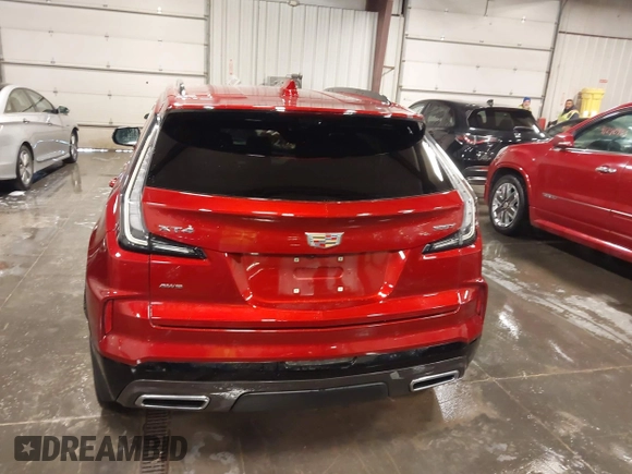 2024 Cadillac XT4 AWD Sport z VIN 1GYFZFR42RF154352, wystawiony jako IAAI lot #41249916 z przebiegiem 27 378 mil mil oraz . Historia ofert i sprzedaży dostępna na DreamBid. Obrazek 16.