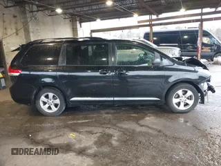 2014 Toyota Sienna LE AAS with VIN 5TDKK3DC7ES426751, listed as a IAAI auction lot 41975870 with 100,000 mi miles and . Bid and sale history available at carsss.com. Image 14.