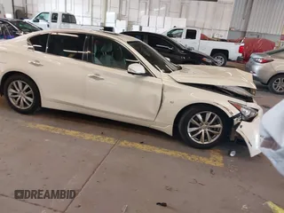 2015 Infiniti Q50 Premium with VIN JN1BV7APXFM353042, listed as a IAAI auction lot 42327460 with 108,497 mi miles and . Bid and sale history available at DreamBid. Image 14.