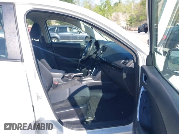 2015 Mazda CX-5 Sport with VIN JM3KE4BY3F0495511, listed as a IAAI auction lot 42170968 with 206,217 mi miles and . Bid and sale history available at carsss.com. Image 5.
