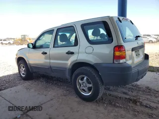 2005 Ford Escape XLS Value with VIN 1FMYU02Z05KA40024, listed as a Copart auction lot 66042064 with 130,677 mi miles and Salvage Title. Bid and sale history available at carsss.com. Image 2.