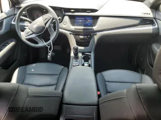 2023 Cadillac XT5 FWD Premium Luxury with VIN 1GYKNCRS3PZ135585, listed as a Copart auction lot 58891914 with 32,325 mi miles and Salvage Title. Bid and sale history available at carsss.com. Image 8.