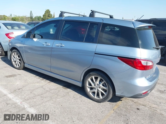 2012 Mazda 5 Grand Touring with VIN JM1CW2DL6C0126640, listed as a IAAI auction lot 42076722 with 124,412 mi miles and . Bid and sale history available at DreamBid. Image 3.