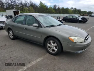 2002 Ford Taurus SE Standard z VIN 1FAFP53U92A246842, wystawiony jako Copart lot #57858765 z przebiegiem 64 545 mil mil oraz Tytuł czysty. Historia ofert i sprzedaży dostępna na DreamBid. Obrazek 4.