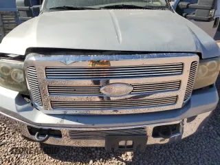 2005 Ford Excursion Special Serv with VIN 1FMNU40L65EB83177, listed as a Copart auction lot 54271885 with 147,145 mi miles and Salvage Title. Bid and sale history available at DreamBid. Image 12.