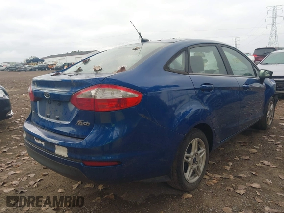 2018 Ford Fiesta SE with VIN 3FADP4BJ4JM132094, listed as a IAAI auction lot 40393706 with 142,494 mi miles. Bid and sale history available at carsss.com. Image 4.
