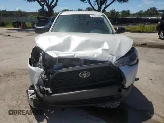 2022 Toyota Corolla Cross L with VIN 7MUAAAAG6NV028639, listed as a Copart auction lot 61252535 with 25,583 mi miles and Non repairable. Bid and sale history available at DreamBid. Image 5.