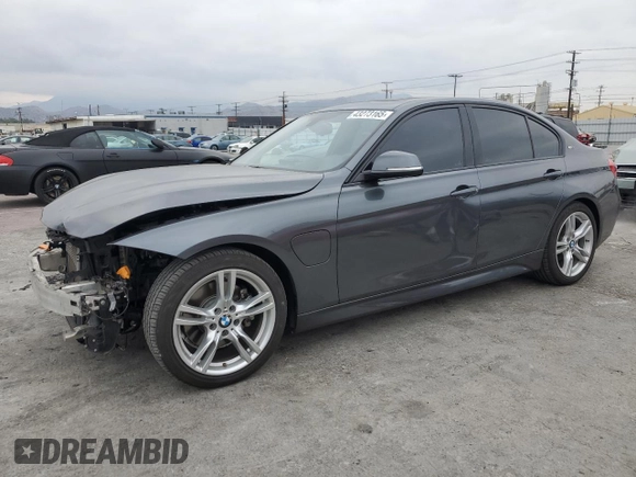 2018 BMW 3 Series 330e iPerformance with VIN WBA8E1C52JA758674, listed as a Copart auction lot 43273165 with 77,325 mi miles and Salvage Title. Bid and sale history available at carsss.com. Image 1.