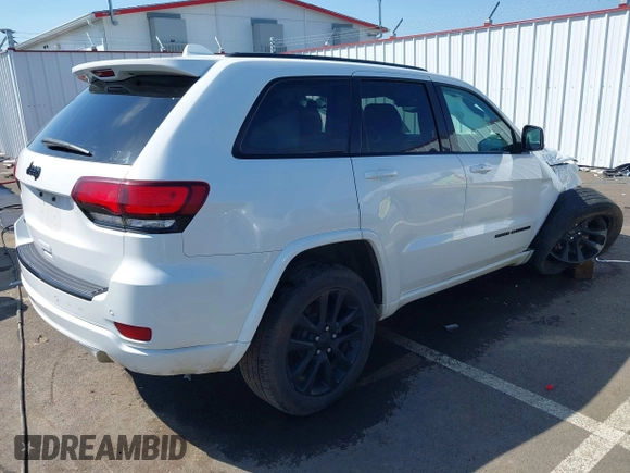 2018 Jeep Grand Cherokee Altitude with VIN 1C4RJFAG0JC296947, listed as a IAAI auction lot 42034656 with 93,979 mi miles and . Bid and sale history available at DreamBid. Image 4.