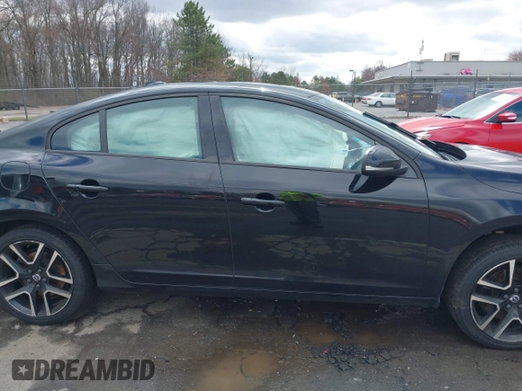 2018 Volvo S60 Dynamic with VIN YV140MTLXJ2459745, listed as a IAAI auction lot 41988052 with 133,268 mi miles. Bid and sale history available at carsss.com. Image 13.